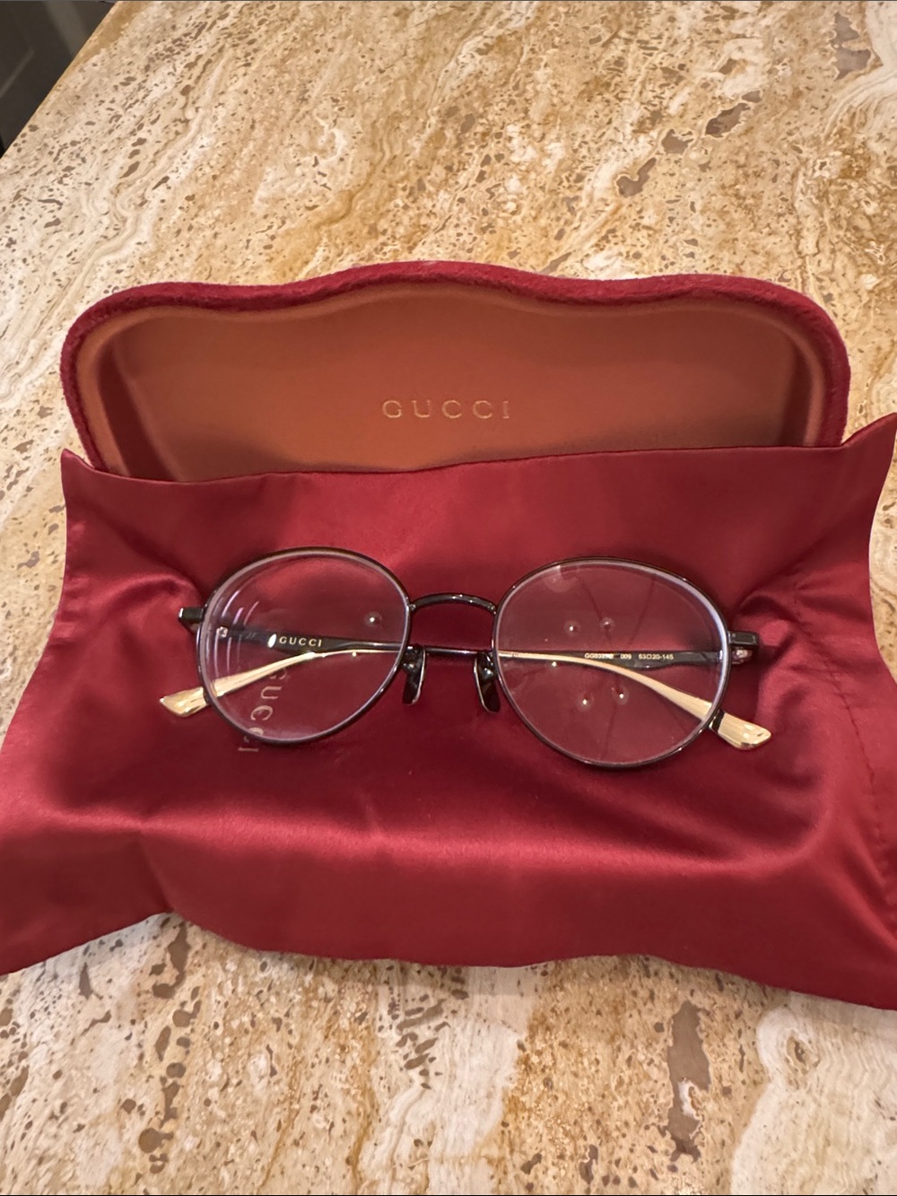 Gucci Round Metal Frame Glasses in Black with Gold Temples
